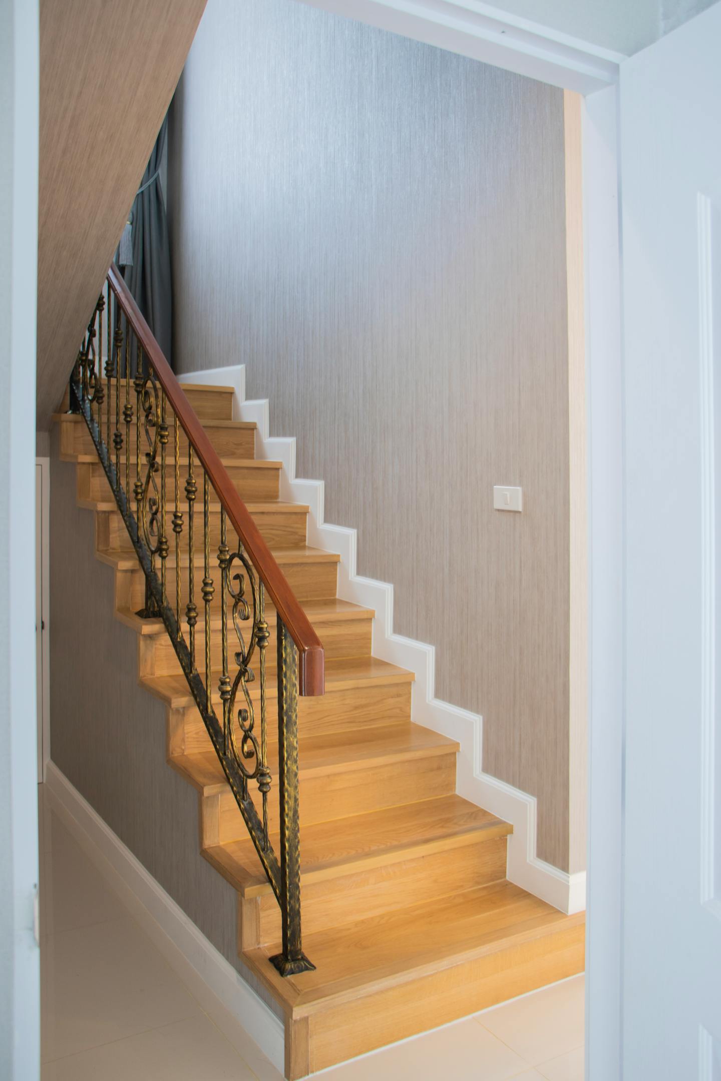Custom under-stairs storage built to maximise unused space